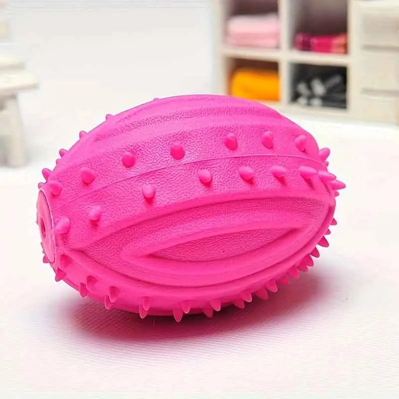 Bola de Rugby TPR para Cães Resistentes e Coloridas | Caprioli Shop brinquedo cães ROSA