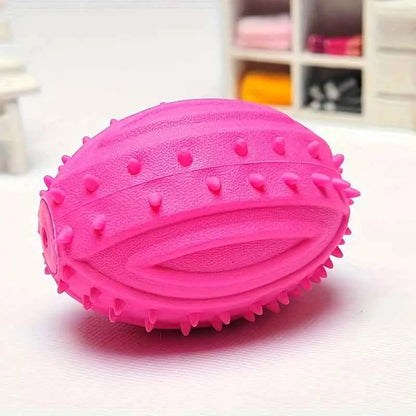 Bola de Rugby TPR para Cães Resistentes e Coloridas | Caprioli Shop brinquedo cães ROSA
